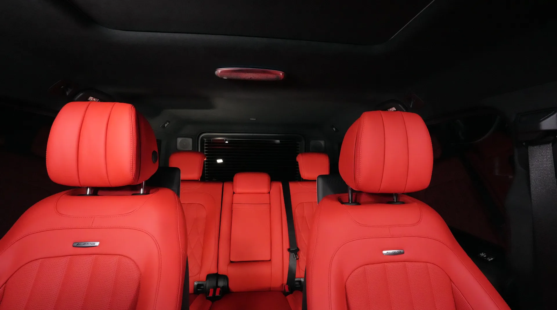 Discover the Mercedes-Benz G63 AMG, finished in Magno Black with a Red interior and powered by a 577 HP V8 engine.