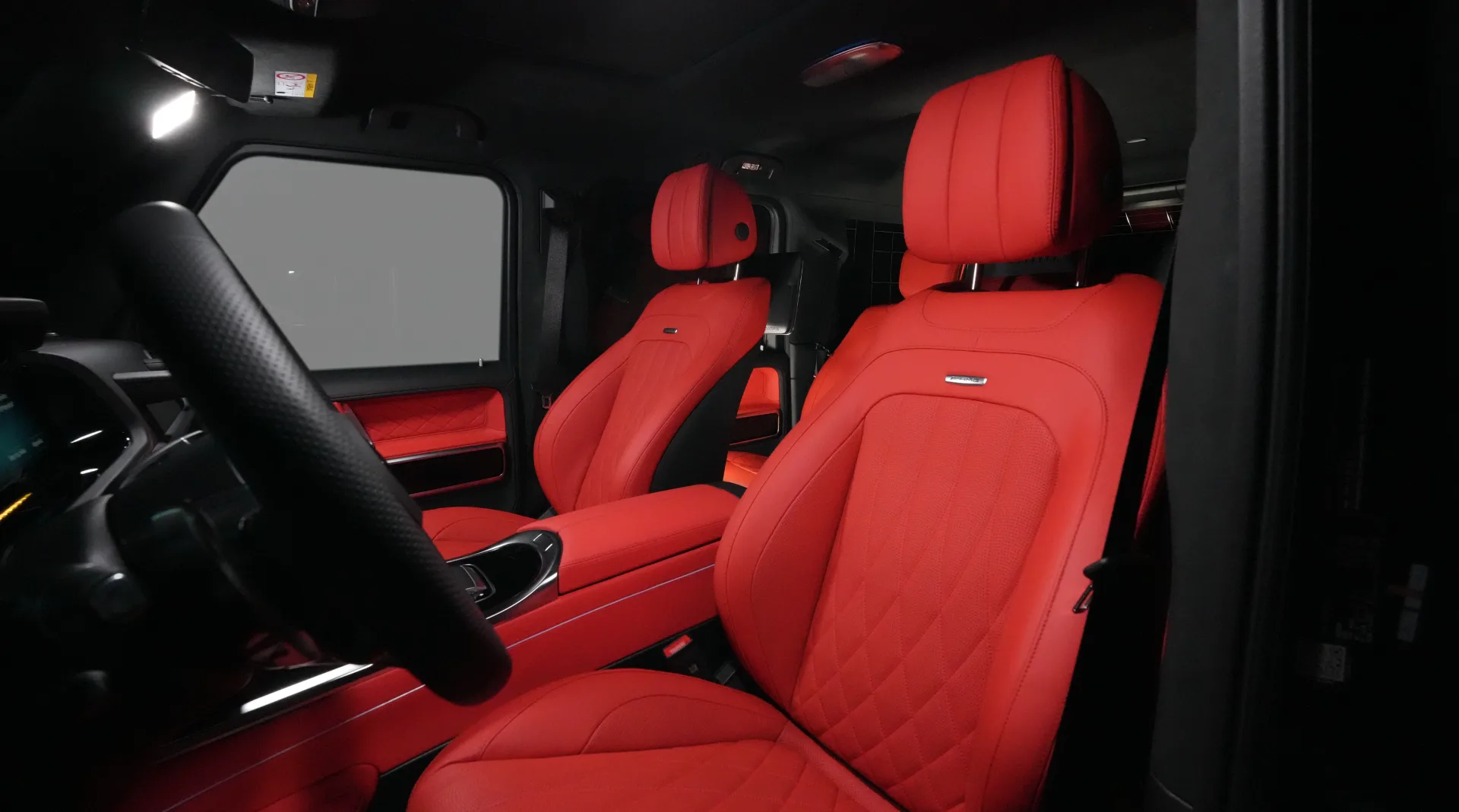 Buy the Mercedes-Benz G63 AMG | Magno Black, combining its distinctive exterior finish with a Red interior and 577 HP.