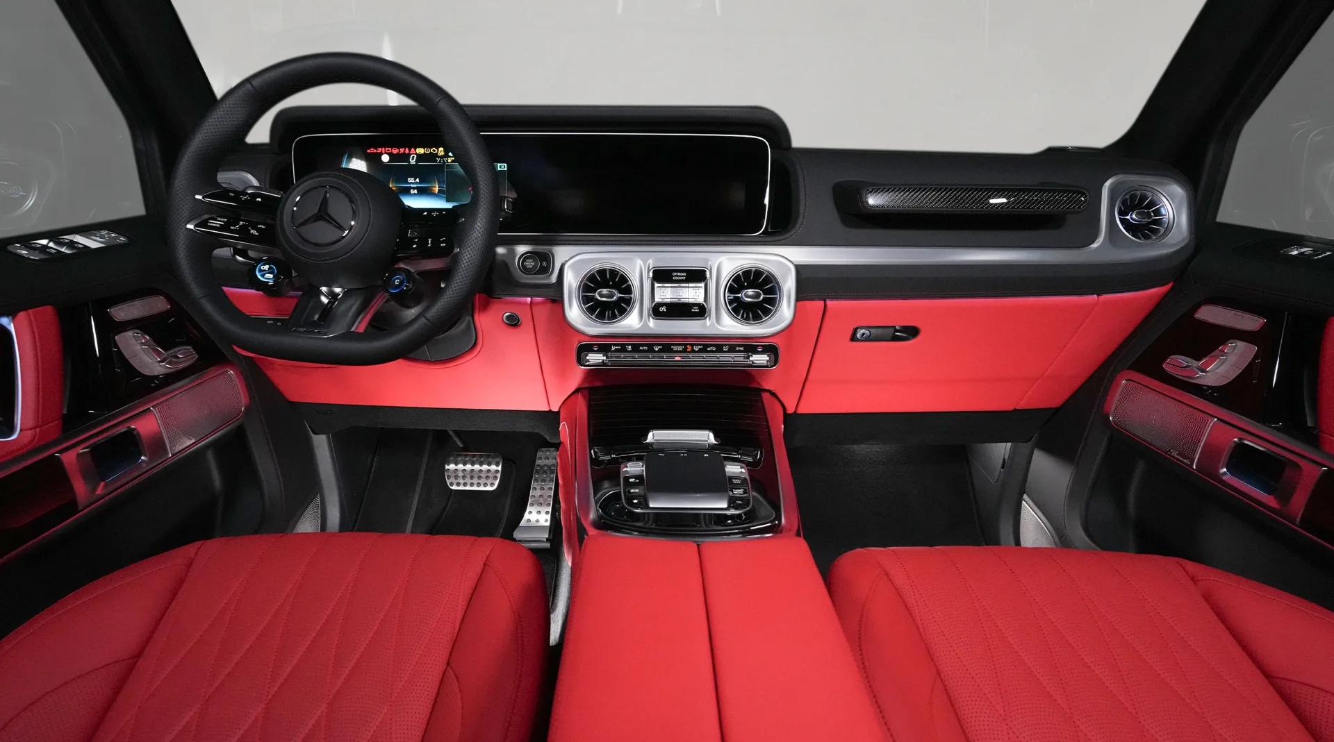 Experience the Mercedes-Benz G63 AMG in Magno Black, featuring a Red interior and powerful V8 engine.