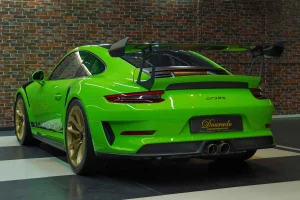 Porsche 911 GT3 RS in Green Exotic Car Dealership in Dubai