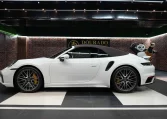 Buy Porsche 911 Turbo S Cabriolet in white in UAE