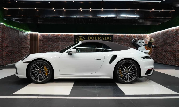 Buy Porsche 911 Turbo S Cabriolet in white in UAE