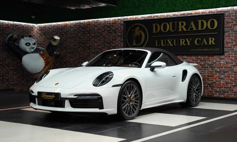 Buy Porsche 911 Turbo S Cabriolet in white in Dubai