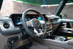 Mercedes g 63 AMG Double in Brown Exotic Car Dealership in UAE