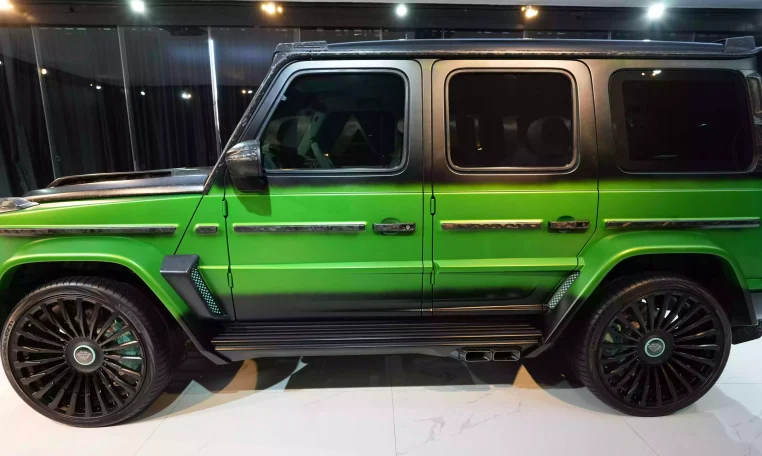 G7X Onyx Concept 1 of 5 Green Light & Black Magno Luxury car Dealership
