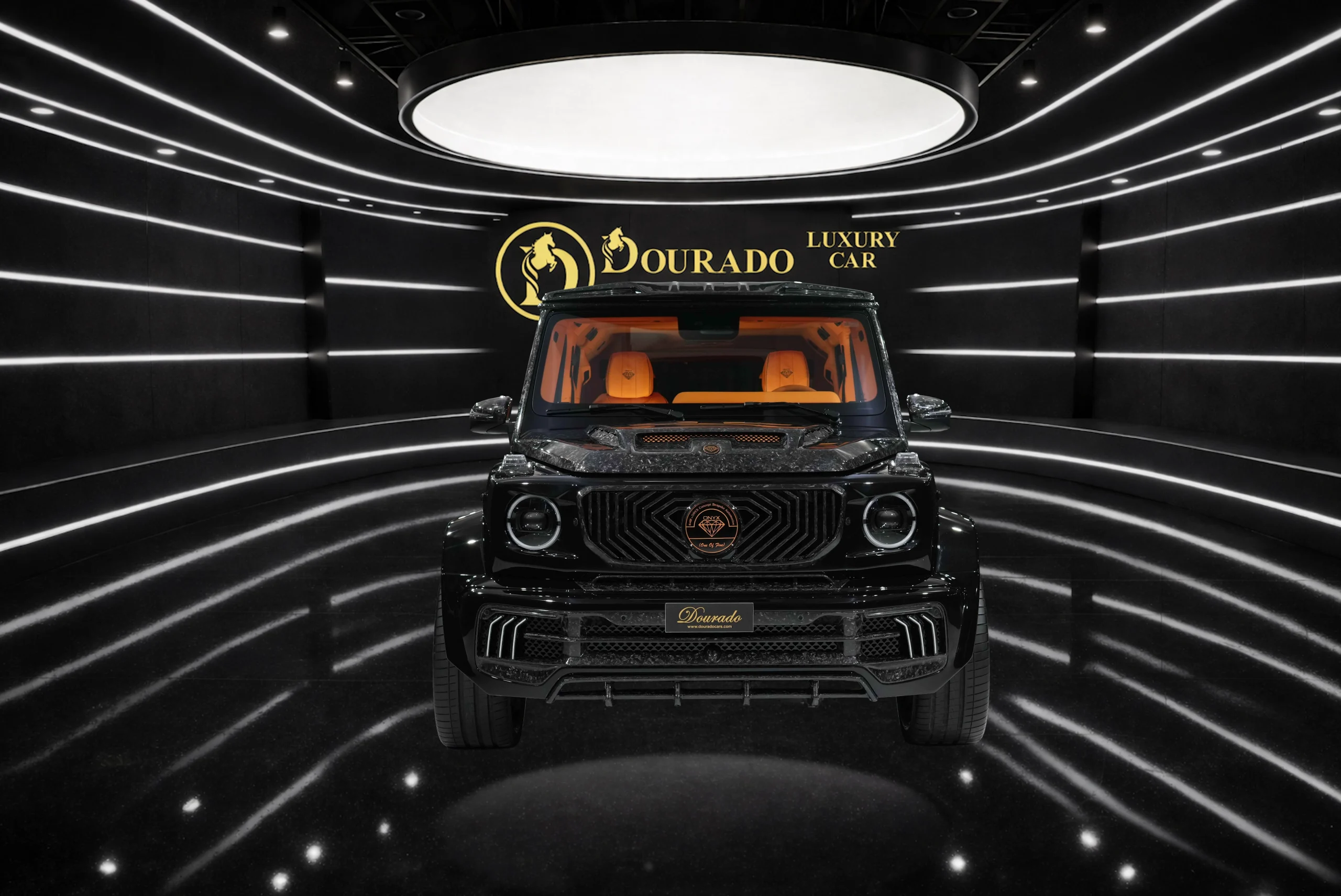Black luxury SUV centered in a sleek showroom with curved white light stripes and a large circular ceiling lamp behind; Dorado Luxury Car logo visible on the wall.