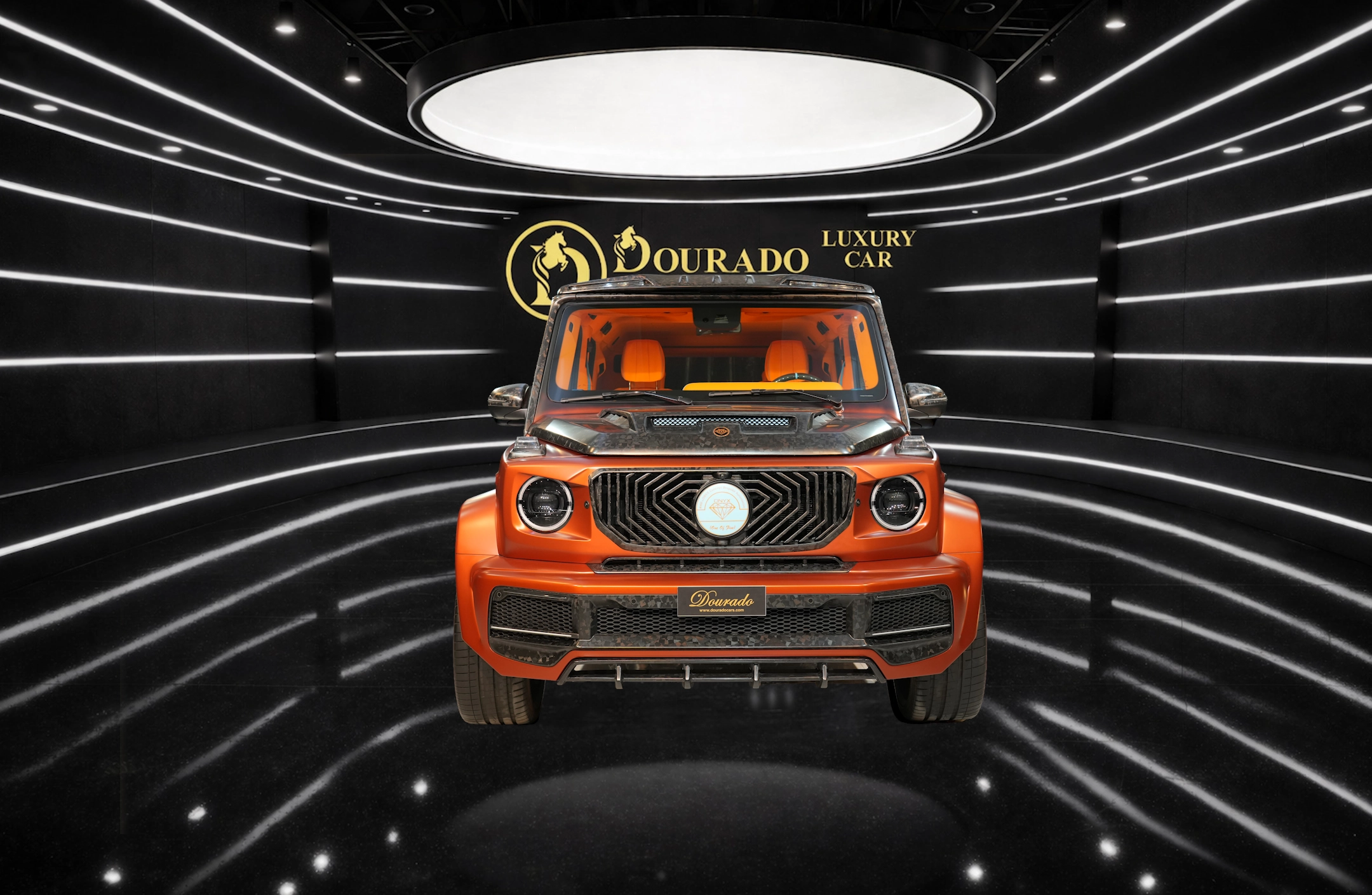 Orange luxury SUV shown from the front in a black, futuristic showroom with 'Dourado Luxury Car' signage behind it and orange interior visible through the windshield.